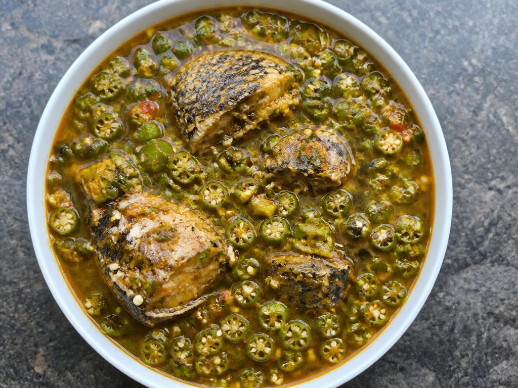 Bowl of Nigerian okra soup with fish